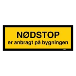 Nødstop er anbragt på bygningen. Bygningsskilt