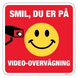 Smil du er på Video-overvågning Skilt (hvid på rød)